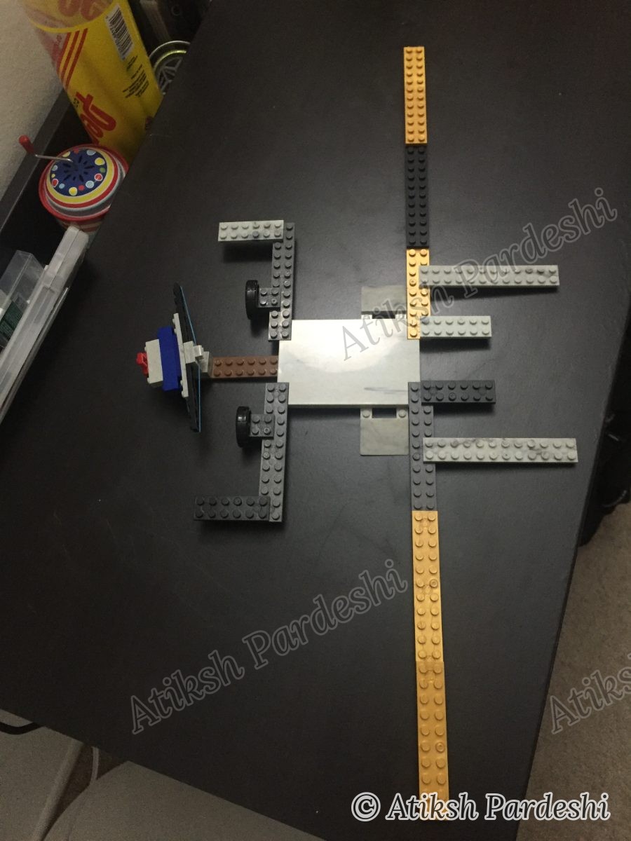 Lego build with sensor booms and landing wheels